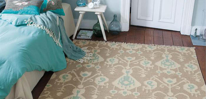 Beige katoenen tapijt met patroon